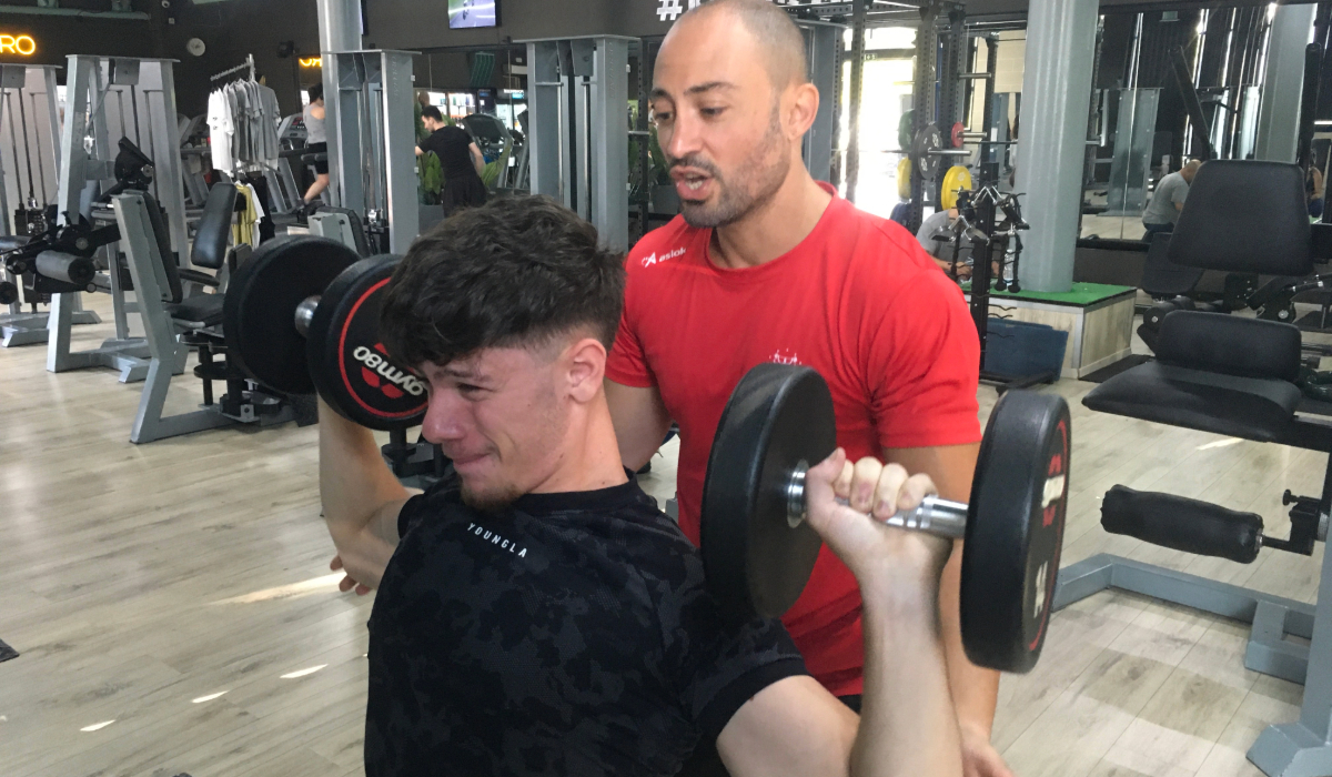PT Diploma spotting and forced reps with client